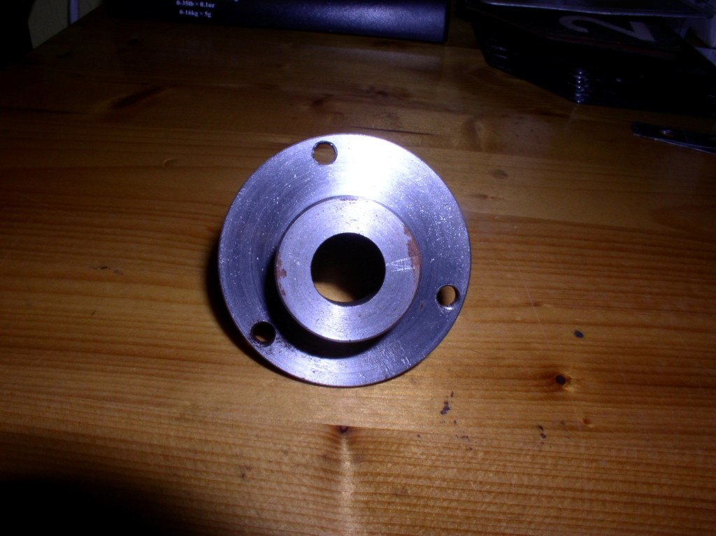 Crankshaft pulley adapter for using later crankshafts.