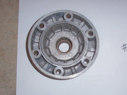 Disc brake hub flange / bearing carrier (non-disc side) for Moto Guzzi 850 GT, 850 GT California, Eldorado, and 850 California Police motorcycles fitted with a disc front brake.