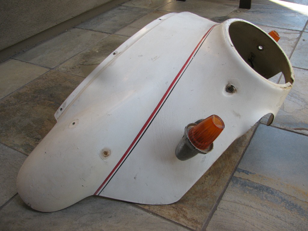 Moto Guzzi fairing (MG# 12575421). Lights are not original.