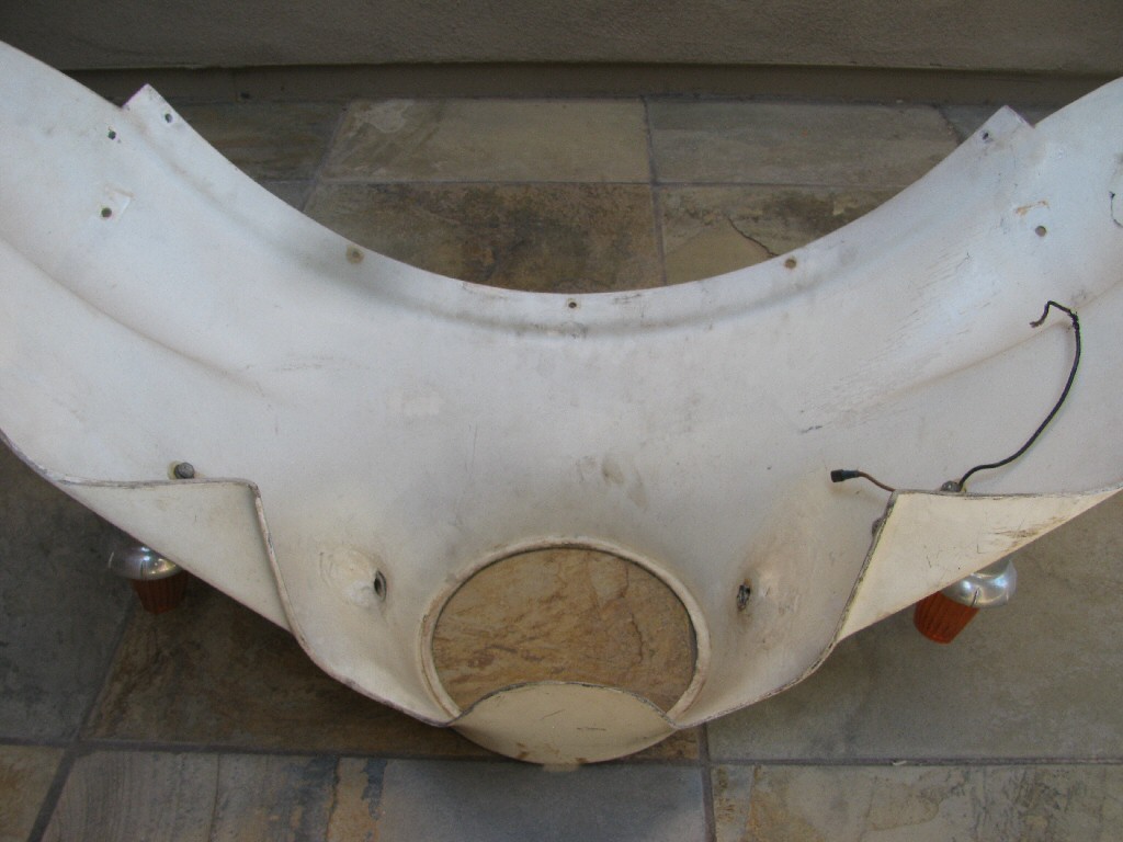 Moto Guzzi fairing (MG# 12575421). Lights are not original.