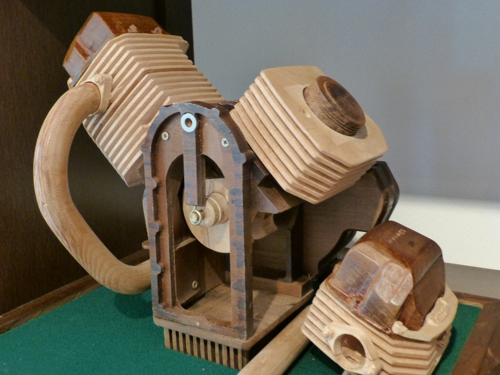 Wood model of a Moto Guzzi engine.