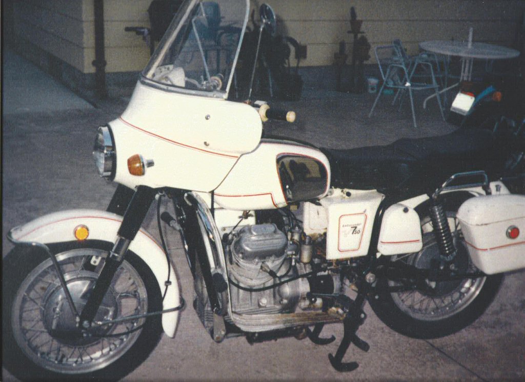 George Vignovich's A-series Moto Guzzi Ambassador with metal saddlebags.