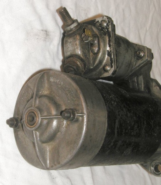 Magneti Marelli starter with a Bosch solenoid (part number 0331-300-019). Not believed to have come from Moto Guzzi, but rather an aftermarket fitment.