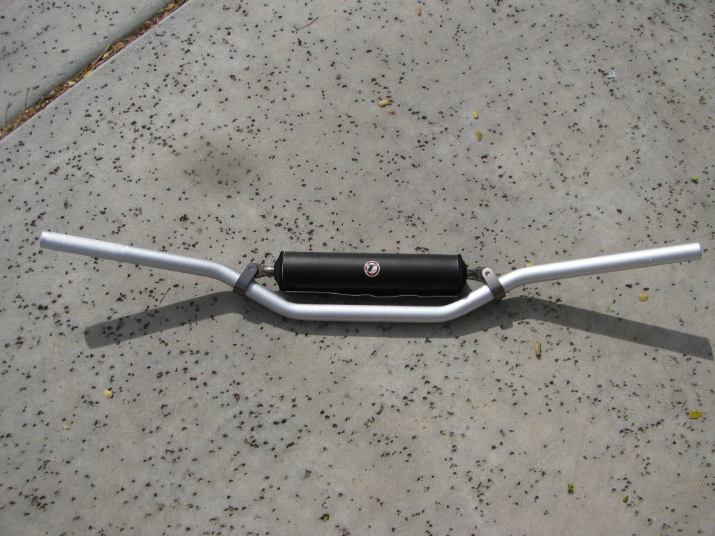 Tusk T-10 Aluminum, CR Mid Bend handlebars.